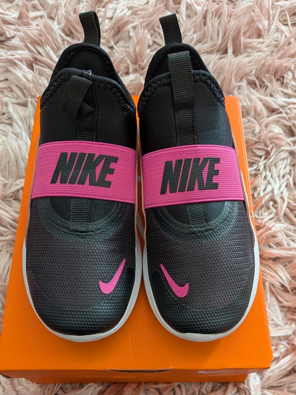 Nike Kids Black Slip-On Sneakers with Pink Accents